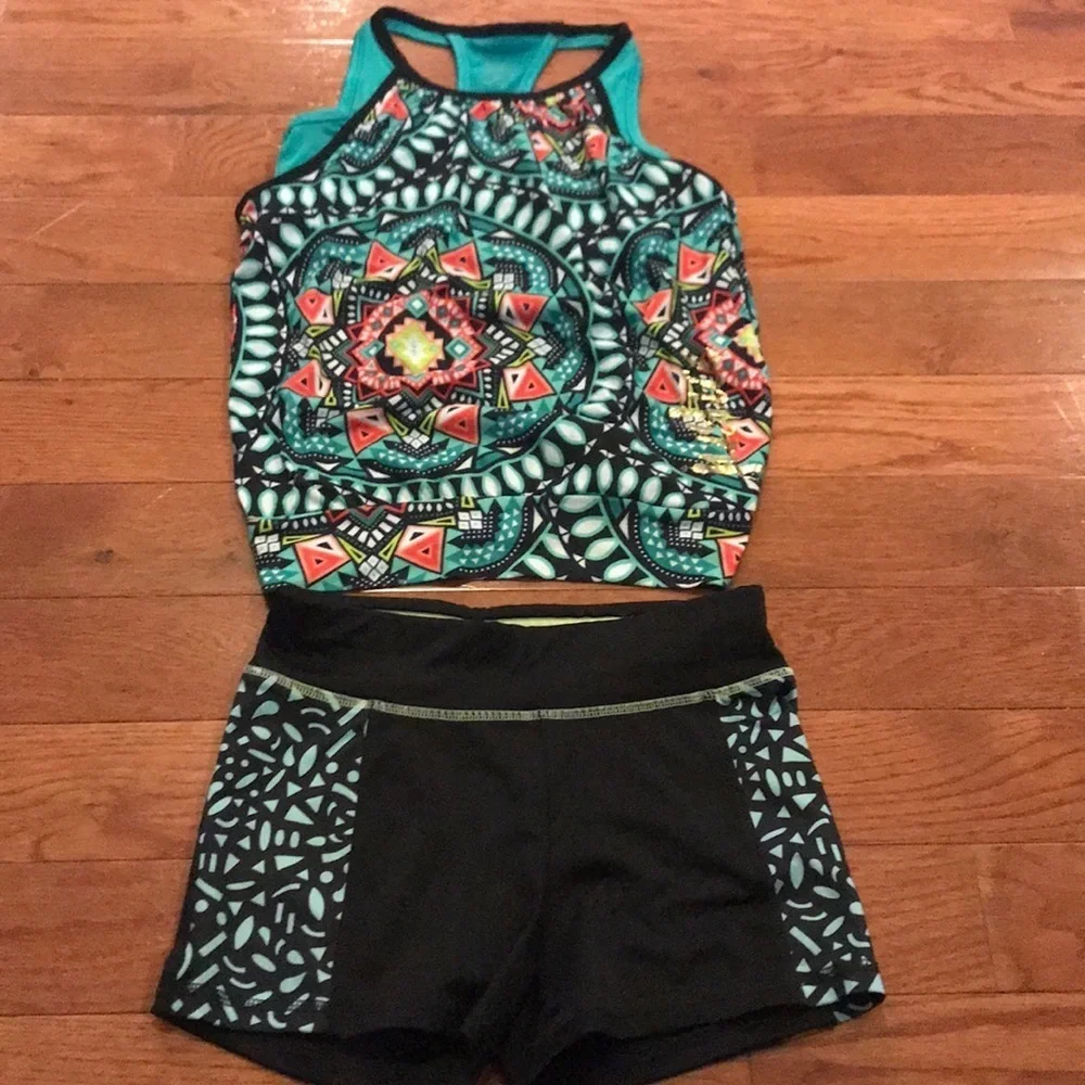 JUSTICE size 10 top and bottom 12